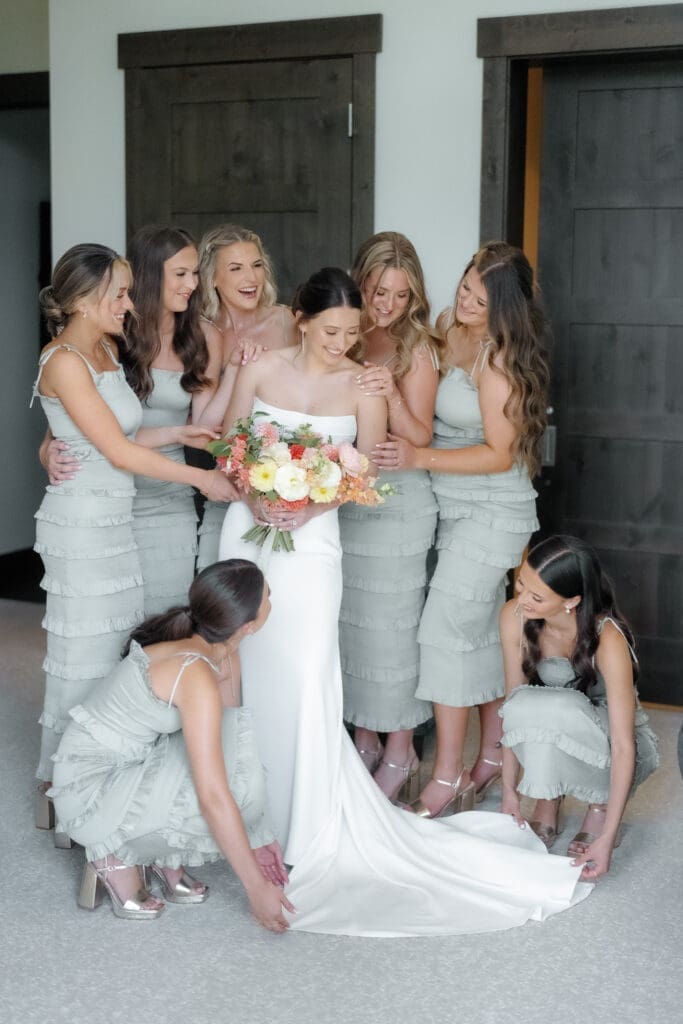Bride with bridesmaids getting ready before an Edgewood Lake Tahoe wedding. z