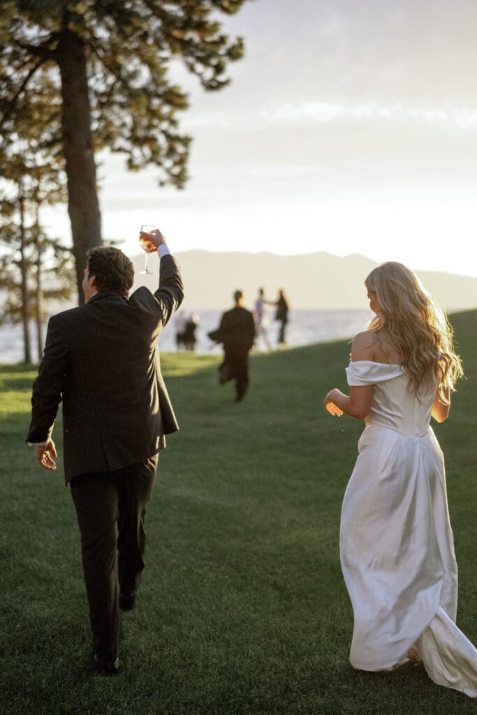 Guests enjoying sunset views overlooking Lake Tahoe at Edgewood Resort.