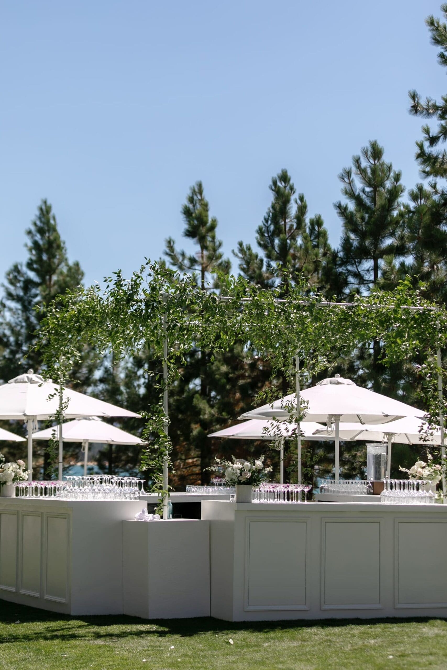 Outdoor cocktail bar setup during an Edgewood Tahoe 17th Green wedding