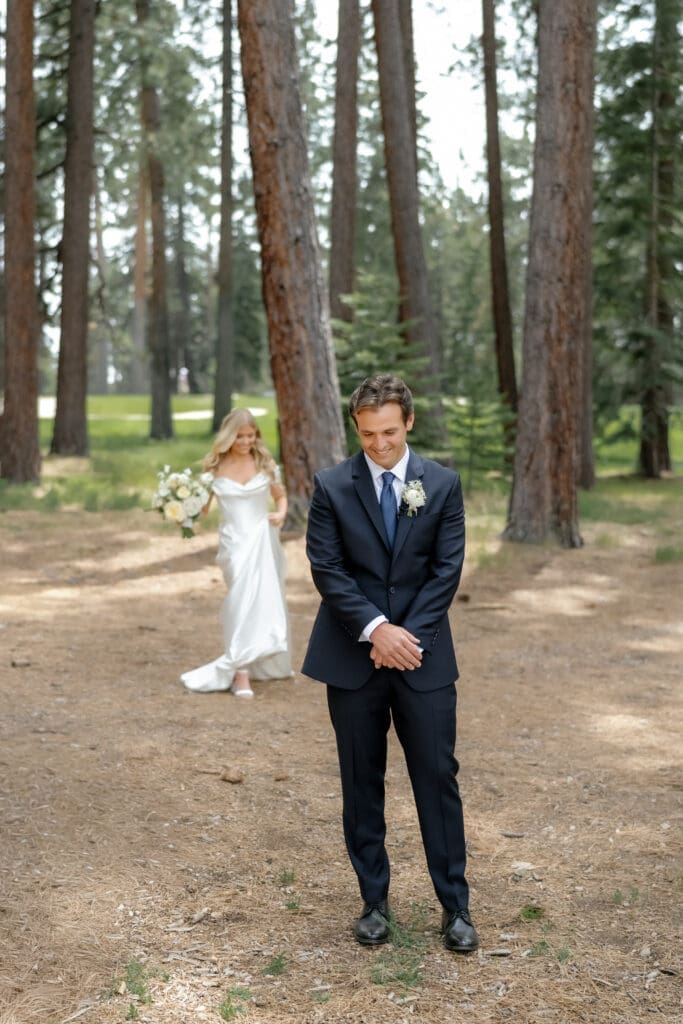First look portrait beneath the pine trees near Lot B at Edgewood Tahoe Resort