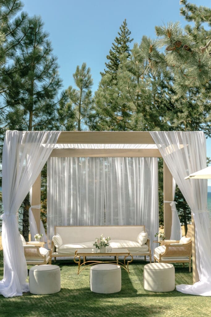 Lounge seating beneath a reception cabana at Edgewood Tahoe Resort
