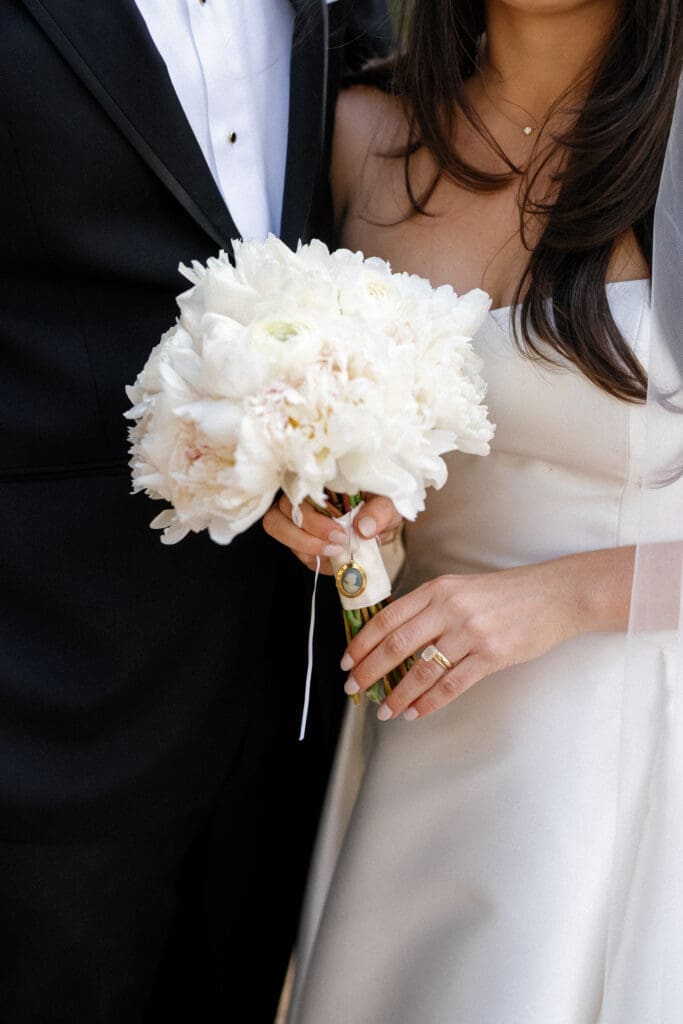 Bridal bouquet and wedding attire details photographed at Edgewood Tahoe.