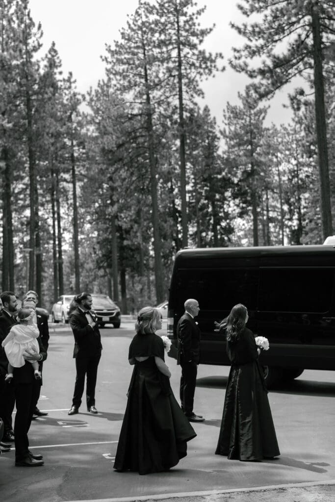 Guests arriving in shuttle for an Edgewood Tahoe wedding ceremony beside the North Room