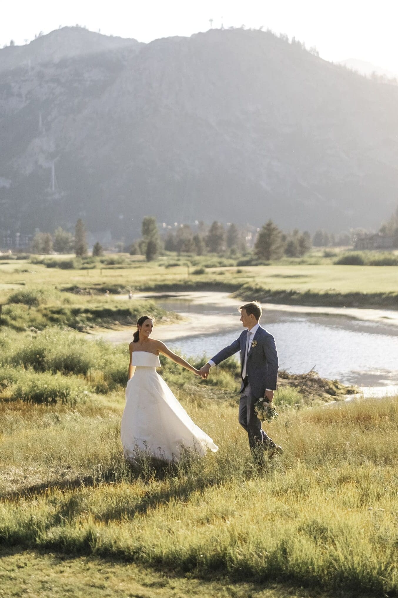 Bride and groom portraits in the meadow at Everline Resort Lake Tahoe