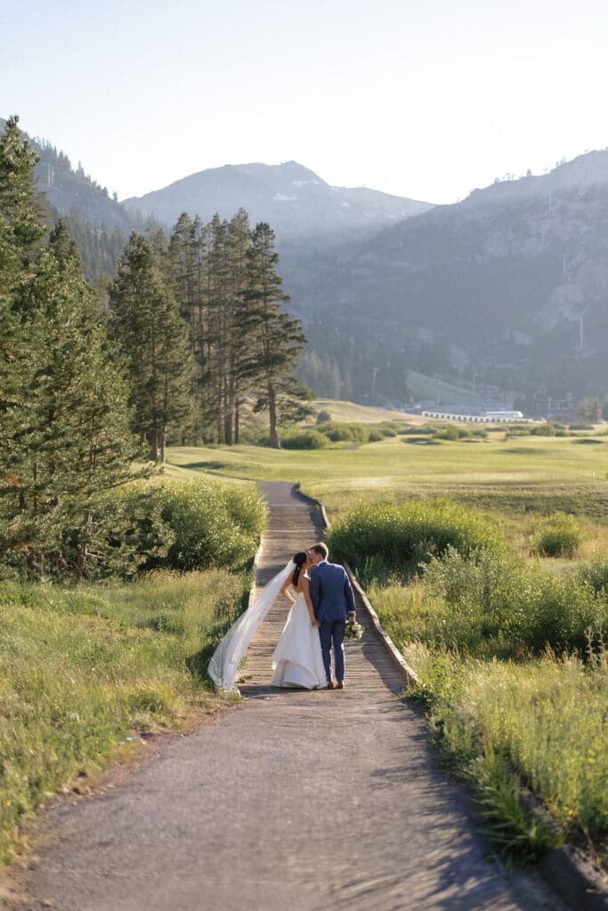 Wedding portraits along the golf course path at Everline Resort in Olympic Valley