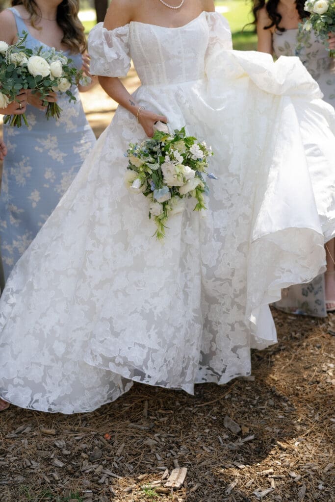 Close-up of a bridal bouquet and gown details during a Lake Tahoe wedding morning.
