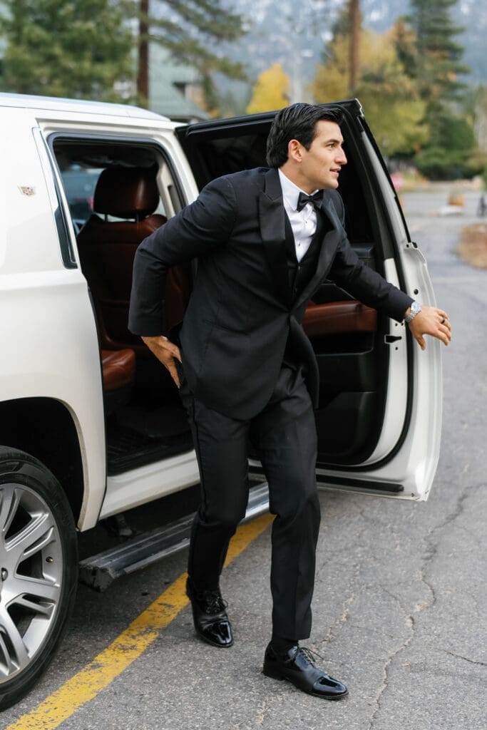 Groom arriving at Riva Grill for a Lake Tahoe wedding celebration.