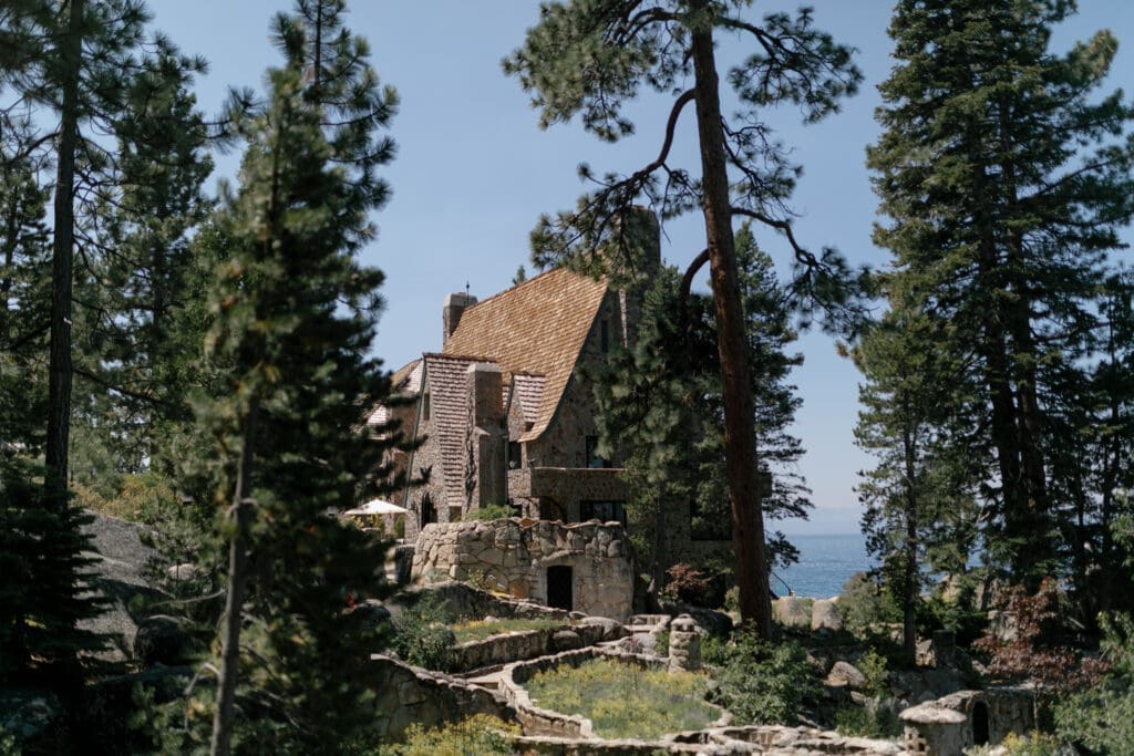 Historic Thunderbird Lodge surrounded by pine trees overlooking Lake Tahoe on the East Shore