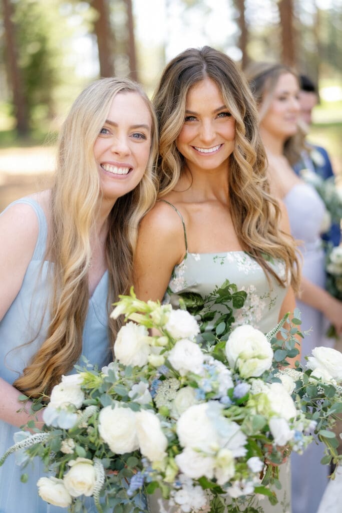Bridesmaids holding bouquets during wedding party portraits at Edgewood Tahoe.