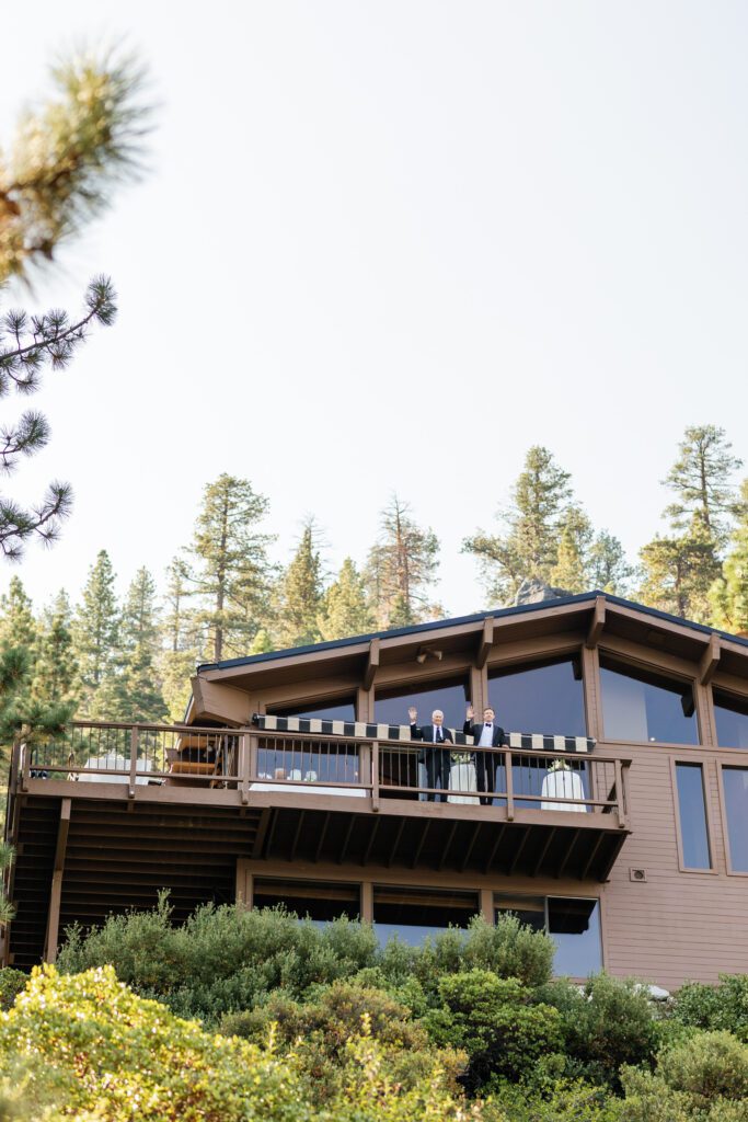 Luxury mountain estate featuring expansive outdoor terraces, contemporary architecture, and surrounding pine trees in Lake Tahoe.